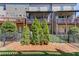 Well-manicured backyard with artificial turf and professional landscaping at 1005 Milhaven Dr, Roswell, GA 30076