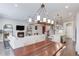 Open-concept living space integrating the kitchen, dining, and living areas, ideal for entertaining and Gathering time at 1005 Milhaven Dr, Roswell, GA 30076