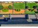 Aerial view of a community pool with tables, chairs, and ample space to relax at 1005 Milhaven Dr, Roswell, GA 30076