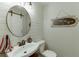 Elegant half bath features modern fixtures, attractive decorations, and shiplap walls at 1484 W Prospect Dr, Lawrenceville, GA 30043