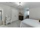 Bedroom with large closet, neutral paint, plush carpet, and a comfortable bed at 1484 W Prospect Dr, Lawrenceville, GA 30043