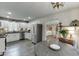 Spacious eat-in kitchen featuring stainless steel appliances and a view of the living room at 1484 W Prospect Dr, Lawrenceville, GA 30043