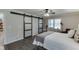 Stylish main bedroom features a closet, natural light, and hardwood flooring at 1484 W Prospect Dr, Lawrenceville, GA 30043