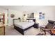 Neutral bedroom features a zebra art piece and an ensuite bathroom entrance at 3201 Lenox Ne Rd # 22, Atlanta, GA 30324