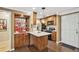 Efficient kitchen features wooden cabinets, stainless steel appliances, and a built-in bar area at 3201 Lenox Ne Rd # 22, Atlanta, GA 30324