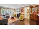 Stylish living room with hardwood floors, a fireplace, and a built-in bar area for convenient entertaining at 3201 Lenox Ne Rd # 22, Atlanta, GA 30324