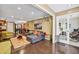 Open-concept living area with hardwood floors and large windows, creating a bright and inviting space at 3201 Lenox Ne Rd # 22, Atlanta, GA 30324
