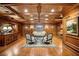 The spacious living room features wood paneling, coffered ceilings, and classic furnishings at 3201 Lenox Ne Rd # 22, Atlanta, GA 30324