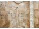 Stylish tiled shower with glass block partition and handheld shower head at 3201 Lenox Ne Rd # 22, Atlanta, GA 30324