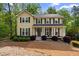 Charming two-story home featuring a classic design, well-maintained landscaping, and a welcoming front porch at 480 Springs End Ne Ln, Marietta, GA 30068