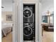 Convenient laundry closet with stacked washer and dryer units, accessible from bedrooms at 480 Springs End Ne Ln, Marietta, GA 30068