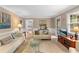 Comfortable living room with neutral tones and views to the kitchen at 480 Springs End Ne Ln, Marietta, GA 30068