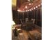 Inviting sunroom with wood paneled ceiling, string lights, and comfortable seating, perfect for relaxing at 480 Springs End Ne Ln, Marietta, GA 30068