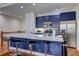 Eat-in kitchen featuring a marble countertop island, stainless steel appliances, and lots of storage at 5883 Brookside Oak Cir, Norcross, GA 30093