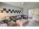 The spacious living room offers comfortable seating, stylish decor, and ample natural light at 5883 Brookside Oak Cir, Norcross, GA 30093