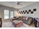 The spacious living room offers comfortable seating, stylish decor, and ample natural light at 5883 Brookside Oak Cir, Norcross, GA 30093