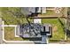 Aerial view showcasing the property's layout, manicured lawn, patio, and fire pit area at 662 S Grand Nw Ave, Atlanta, GA 30318