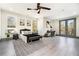 Stylish bedroom with a ceiling fan, balcony access and natural light at 662 S Grand Nw Ave, Atlanta, GA 30318