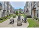 Inviting community space with seating area, landscaping, and a water feature at 2032 Holtz Ln, Atlanta, GA 30318