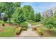 Picturesque community space featuring walking paths and beautifully landscaped green spaces, for relaxation and recreation at 2032 Holtz Ln, Atlanta, GA 30318