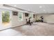 Finished basement area with access to the yard and exercise equipment at 11165 Bentley Chase Dr, Johns Creek, GA 30097