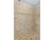 Tile shower featuring decorative accent border and tiled floor at 11165 Bentley Chase Dr, Johns Creek, GA 30097