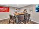 Basement bar area with seating, storage, and drink preparation area, perfect for hosting guests at 213 Roseman Way, Woodstock, GA 30188
