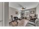Comfortable bedroom features modern ceiling fan and natural light illuminating the workout area at 213 Roseman Way, Woodstock, GA 30188