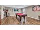 Basement game room features a pool table and decor on the walls at 213 Roseman Way, Woodstock, GA 30188