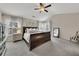 Spacious primary bedroom offers vaulted ceilings, ample natural light, and neutral decor at 213 Roseman Way, Woodstock, GA 30188