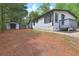 Charming home with well-maintained landscaping and outbuilding at 350 White Birch Dr, Covington, GA 30016