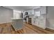 Modern kitchen featuring white cabinets, stainless steel appliances, and stylish kitchen island at 350 White Birch Dr, Covington, GA 30016