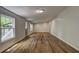 Bright and airy living room showcasing wood-look floors and ample natural light at 350 White Birch Dr, Covington, GA 30016