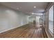 Expansive living space highlighting wood-look floors and an open layout, perfect for entertaining at 350 White Birch Dr, Covington, GA 30016