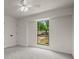 Neutral bedroom with a window offering an outdoor view and a double door closet at 3510 Holliglen Dr, Marietta, GA 30062
