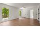 Bright bedroom featuring new floors and large windows with backyard views at 3510 Holliglen Dr, Marietta, GA 30062