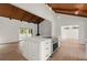 Bright kitchen features an island, modern appliances, and a wood-beamed ceiling at 3510 Holliglen Dr, Marietta, GA 30062