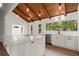 Modern kitchen with a spacious island, stainless steel appliances, stylish lighting and vinyl floors at 3510 Holliglen Dr, Marietta, GA 30062
