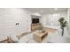 Cozy living room with wood floors, stylish furniture, and bright french doors at 3510 Holliglen Dr, Marietta, GA 30062