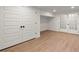 Bright room featuring vinyl flooring and French style exterior access doors at 3510 Holliglen Dr, Marietta, GA 30062