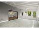 Open sunroom with a sliding door and views of the yard and kitchen at 3510 Holliglen Dr, Marietta, GA 30062