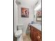 Nicely decorated bathroom with a marble countertop vanity, tiled floor and art at 1261 Lavista Ne Rd # J-4, Atlanta, GA 30324