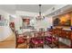 Elegant dining room with hardwood floors, a chandelier, and views into the kitchen at 1261 Lavista Ne Rd # J-4, Atlanta, GA 30324