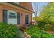 Charming brick townhouse with a well-maintained front yard and black door at 1261 Lavista Ne Rd # J-4, Atlanta, GA 30324