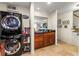 Convenient laundry area with a washer and dryer, plus storage cabinets and a countertop at 1261 Lavista Ne Rd # J-4, Atlanta, GA 30324