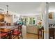 Open-concept living room with access to a dining area, fireplace, and private backyard at 1261 Lavista Ne Rd # J-4, Atlanta, GA 30324