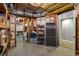 Unfinished basement with storage shelves and doorway to another room at 4350 Oakdale Vinings Se Cir, Smyrna, GA 30080