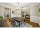 Dining room featuring stylish decor, hardwood floors, and ample seating space at 4350 Oakdale Vinings Se Cir, Smyrna, GA 30080