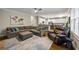 Spacious living room open to kitchen with hardwood floors and a comfortable seating area at 4350 Oakdale Vinings Se Cir, Smyrna, GA 30080