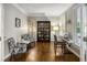 Elegant living room with hardwood floors, a bookshelf, and plenty of natural light at 4350 Oakdale Vinings Se Cir, Smyrna, GA 30080